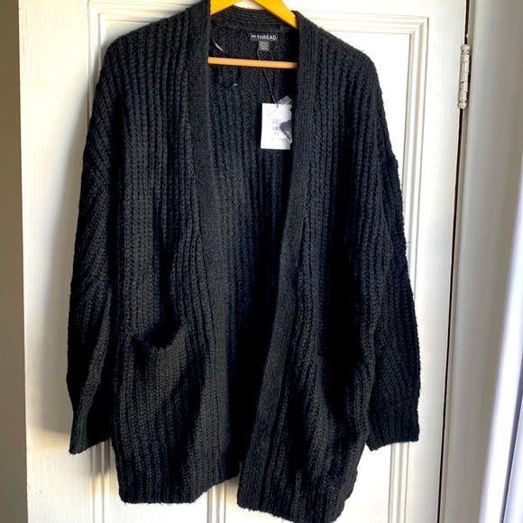 En thread black cardigan with pockets - Picture 1 of 3